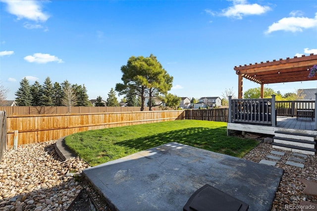 5611 S Sicily Cir, Aurora, CO 80015 - view of yard with a patio, a wooden deck, a fenced backyard, and a pergola