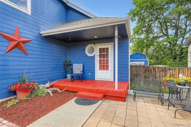13155 W 63rd Pl, Arvada, CO 80004 - property entrance with a patio area and a wooden deck