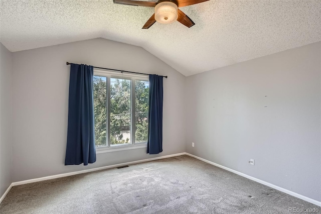 13155 W 63rd Pl, Arvada, CO 80004 - carpeted empty room with a ceiling fan, vaulted ceiling, and a textured ceiling