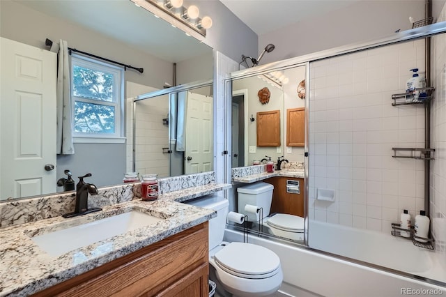13155 W 63rd Pl, Arvada, CO 80004 - bathroom featuring vanity and shower / bath combination with glass door