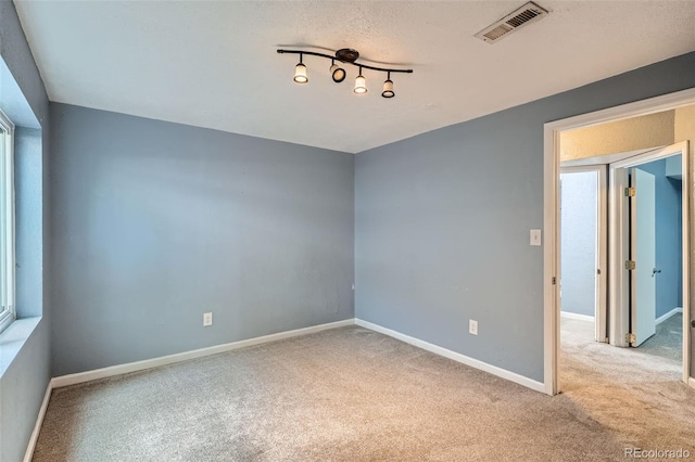 13155 W 63rd Pl, Arvada, CO 80004 - spare room featuring carpet floors and baseboards