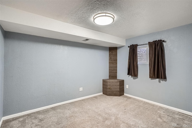 13155 W 63rd Pl, Arvada, CO 80004 - below grade area with carpet floors and a textured ceiling
