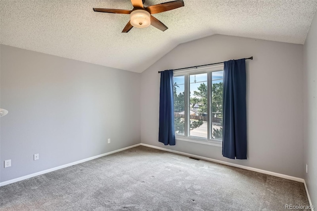 13155 W 63rd Pl, Arvada, CO 80004 - unfurnished room featuring ceiling fan, carpet flooring, lofted ceiling, and a textured ceiling