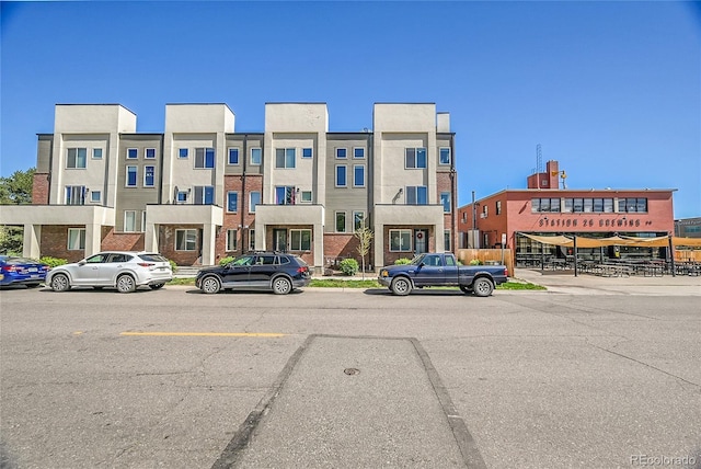 7035 E 38th Ave Unit 4, Denver, CO 80207 - view of property with central AC unit