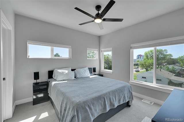 7035 E 38th Ave Unit 4, Denver, CO 80207 - bedroom featuring baseboards, carpet flooring, and ceiling fan