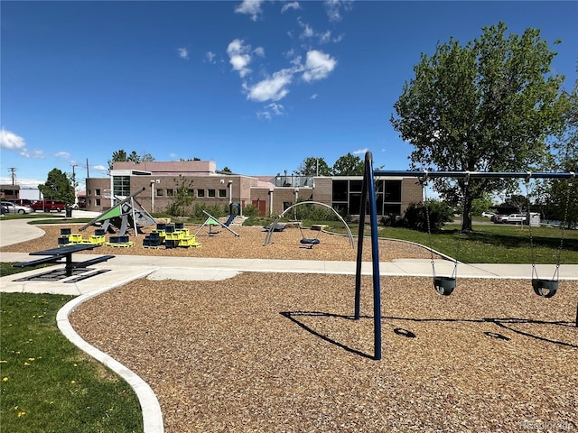 7035 E 38th Ave Unit 4, Denver, CO 80207 - communal playground featuring a lawn