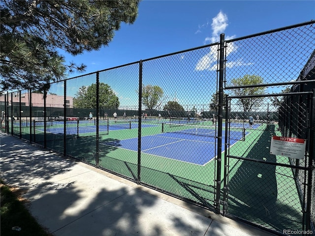7035 E 38th Ave Unit 4, Denver, CO 80207 - view of tennis court with fence