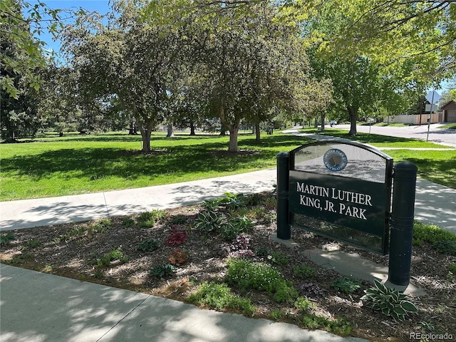 7035 E 38th Ave Unit 4, Denver, CO 80207 - view of community with a lawn
