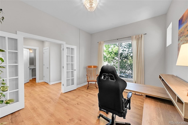 6632 Osage St, Denver, CO 80221 - office area with french doors, light wood-style flooring, and baseboards