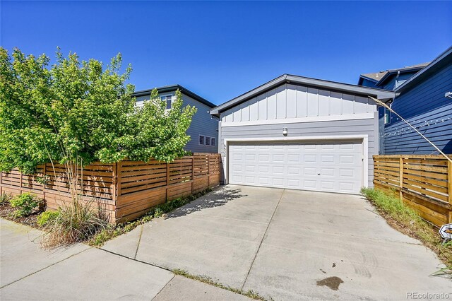 6632 Osage St, Denver, CO 80221 - garage with fence and driveway