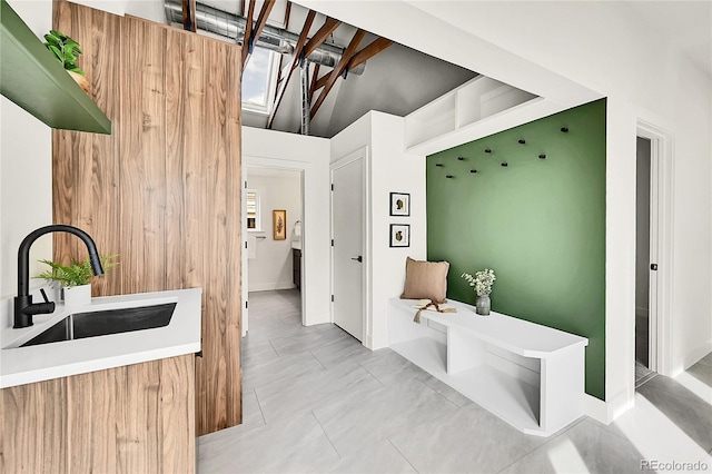 mudroom featuring a sink