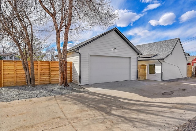 garage featuring fence