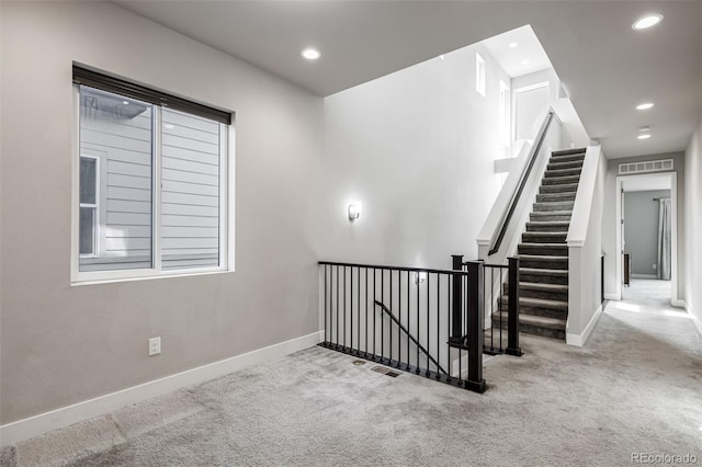 6018 Beeler Ct, Denver, CO 80238 - staircase featuring carpet, baseboards, and recessed lighting