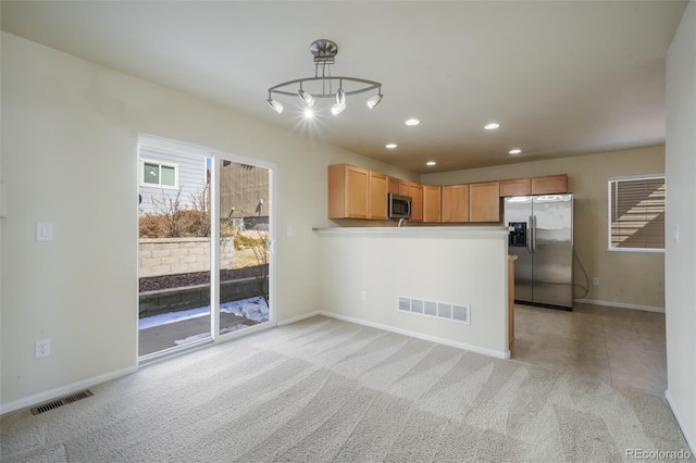 kitchen featuring baseboards, appliances with stainless steel finishes, visible vents, and recessed lighting