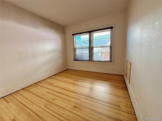 empty room featuring light wood finished floors