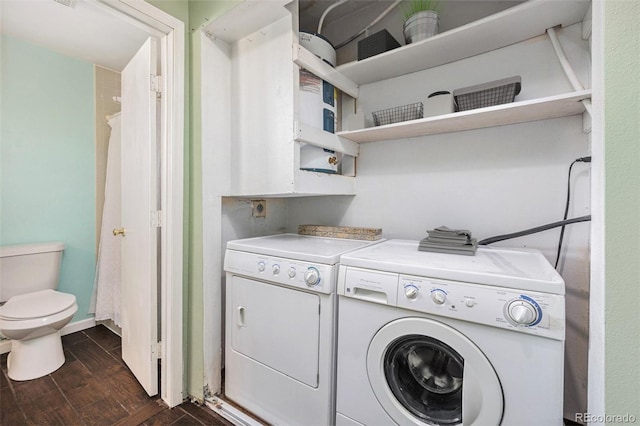 4681 S Decatur St Unit 327, Englewood, CO 80110 - laundry room with washing machine and dryer and dark wood-type flooring