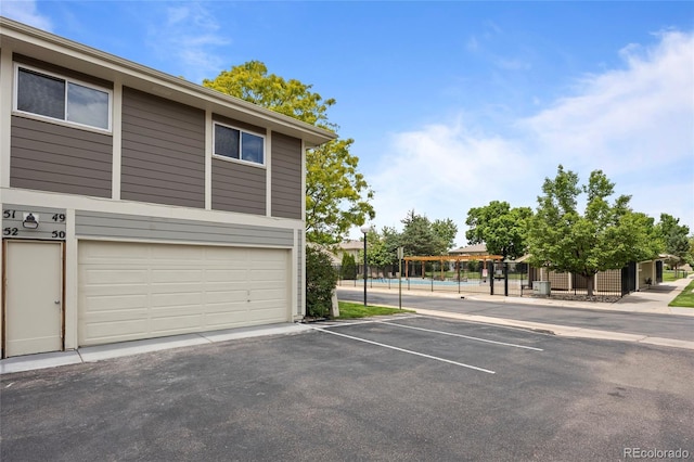 1250 S Monaco Pkwy Unit 50, Denver, CO 80224 - garage with uncovered parking