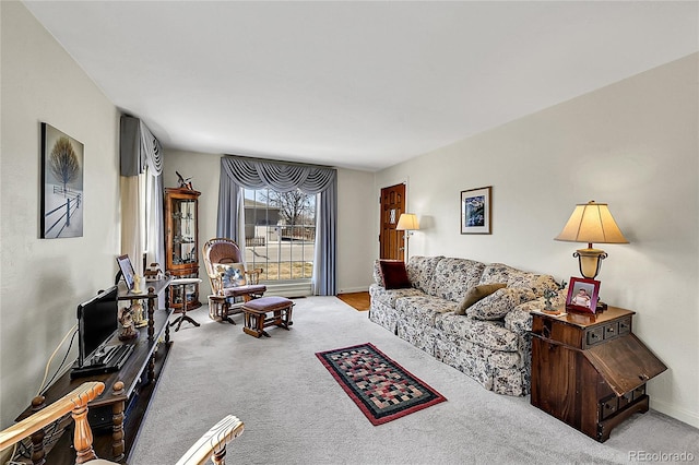 living room featuring baseboards and carpet flooring