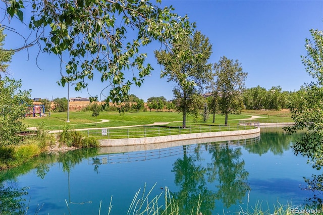 water view featuring fence