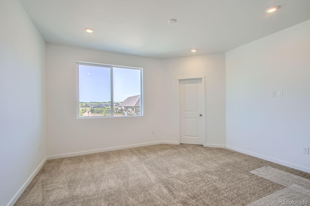 14578 W 90th Ln Unit B, Arvada, CO 80005 - carpeted spare room featuring baseboards and recessed lighting