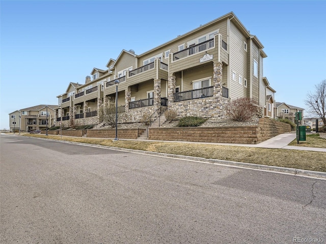 view of property with a residential view