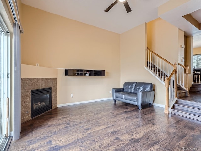11250 Florence St Unit 20B, Commerce City, CO 80640 - sitting room with baseboards, wood finished floors, ceiling fan, and stairway