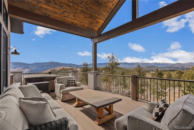 15077 Wilson Peak Rd, Pine, CO 80470 - wooden deck featuring a mountain view, a hot tub, and outdoor lounge area