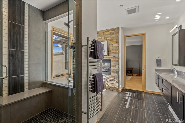 15077 Wilson Peak Rd, Pine, CO 80470 - bathroom featuring tile patterned floors, vanity, a shower stall, and recessed lighting
