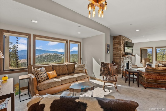 15077 Wilson Peak Rd, Pine, CO 80470 - living room with carpet flooring, a fireplace, recessed lighting, and a chandelier