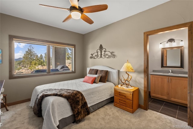 15077 Wilson Peak Rd, Pine, CO 80470 - carpeted bedroom with a sink and a ceiling fan