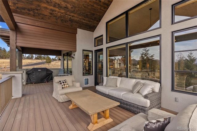 15077 Wilson Peak Rd, Pine, CO 80470 - wooden deck with an outdoor hangout area and grilling area