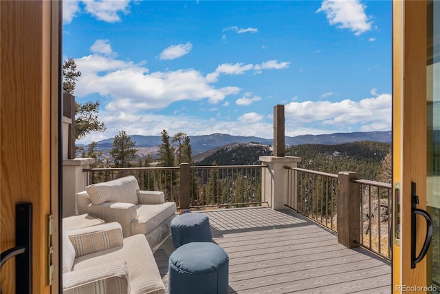 15077 Wilson Peak Rd, Pine, CO 80470 - wooden terrace with a mountain view