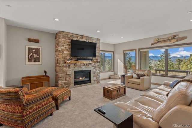 15077 Wilson Peak Rd, Pine, CO 80470 - carpeted living room with a fireplace and recessed lighting
