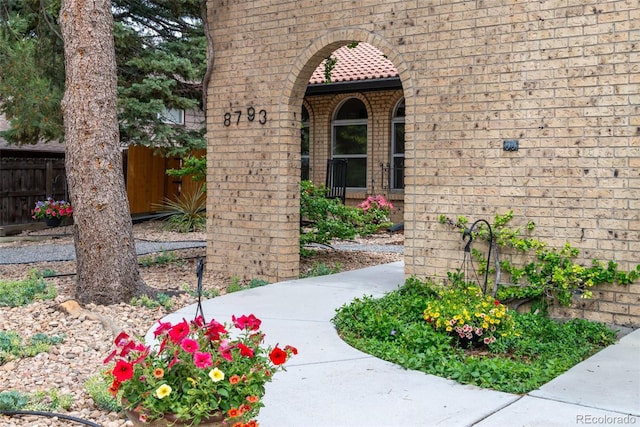 8793 E Monmouth Pl, Denver, CO 80237 - property entrance featuring brick siding