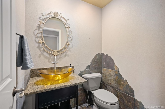 7582 Powderhorn Dr, Lone Tree, CO 80124 - bathroom featuring toilet and vanity