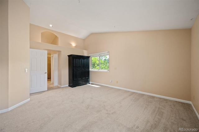 7582 Powderhorn Dr, Lone Tree, CO 80124 - unfurnished bedroom featuring baseboards, carpet flooring, and lofted ceiling