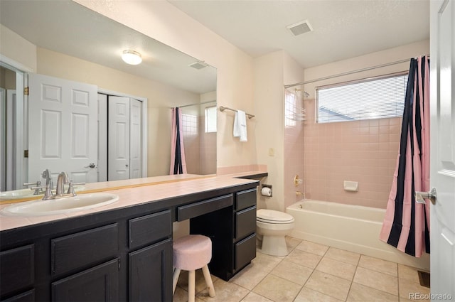 7582 Powderhorn Dr, Lone Tree, CO 80124 - full bath with vanity, shower / bath combination with curtain, toilet, tile patterned flooring, and healthy amount of natural light