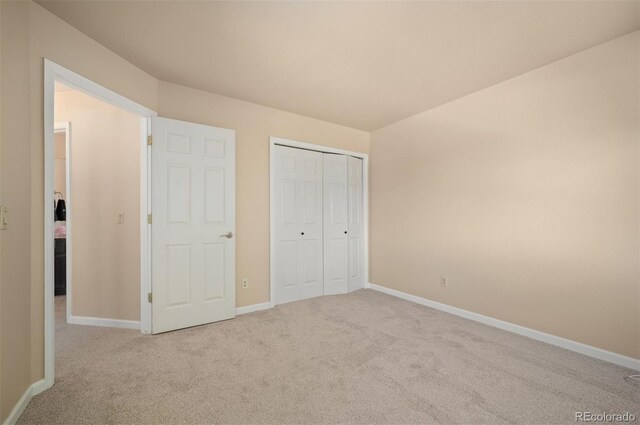 7582 Powderhorn Dr, Lone Tree, CO 80124 - unfurnished bedroom featuring carpet floors, baseboards, and a closet