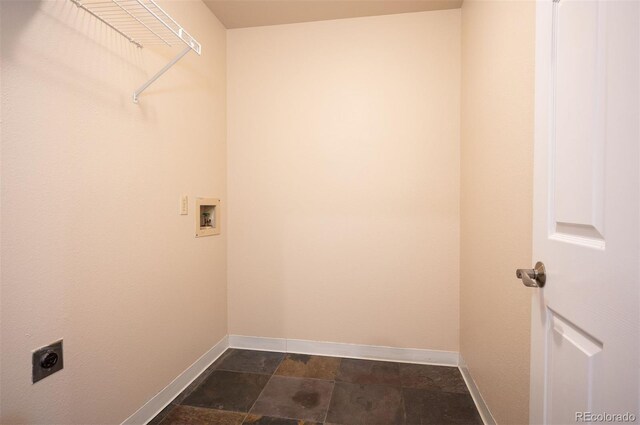 7582 Powderhorn Dr, Lone Tree, CO 80124 - washroom with electric dryer hookup, hookup for a washing machine, baseboards, and dark stone finish flooring