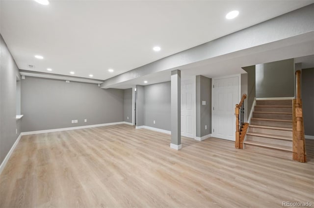 7582 Powderhorn Dr, Lone Tree, CO 80124 - finished below grade area with light wood-style floors, baseboards, recessed lighting, and stairs