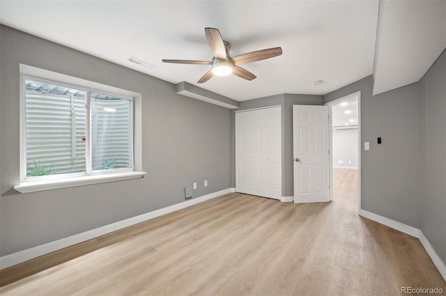 7582 Powderhorn Dr, Lone Tree, CO 80124 - unfurnished bedroom featuring light wood-style floors, baseboards, a closet, and ceiling fan