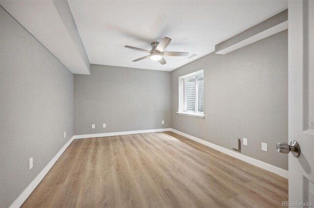 7582 Powderhorn Dr, Lone Tree, CO 80124 - empty room featuring a ceiling fan, wood finished floors, and baseboards