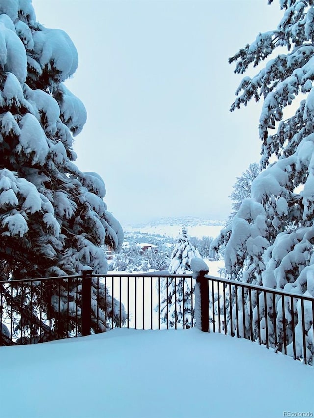view of snow covered deck
