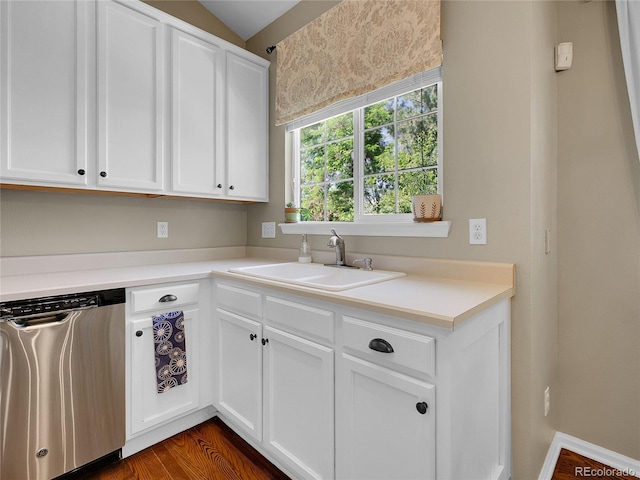 1234 Riddlewood Ln, Highlands Ranch, CO 80129 - kitchen with stainless steel dishwasher, light countertops, white cabinets, and vaulted ceiling