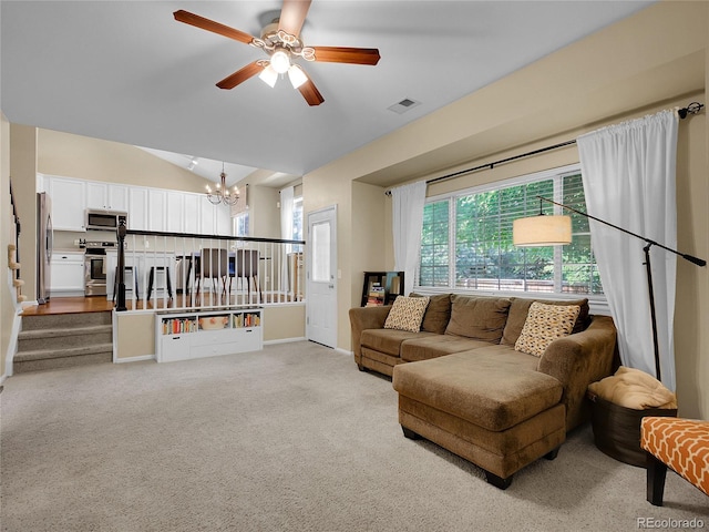 1234 Riddlewood Ln, Highlands Ranch, CO 80129 - living area with a chandelier, vaulted ceiling, stairs, a ceiling fan, and light colored carpet