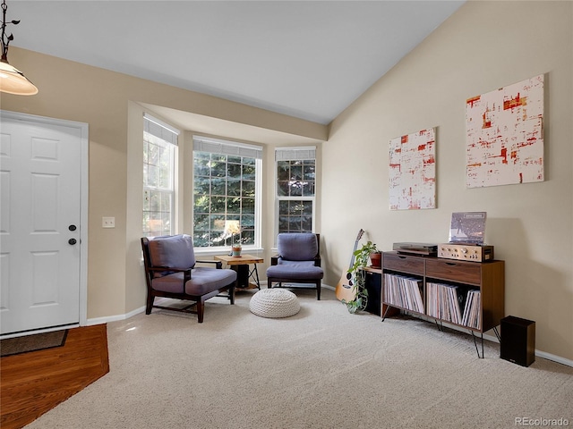 1234 Riddlewood Ln, Highlands Ranch, CO 80129 - sitting room featuring carpet and vaulted ceiling