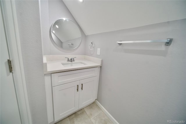 bathroom featuring tile patterned floors and vanity