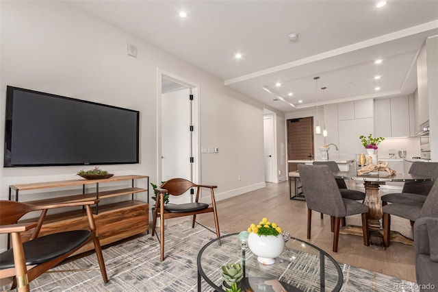 living room with light hardwood / wood-style floors