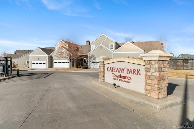 exterior space with a residential view and fence