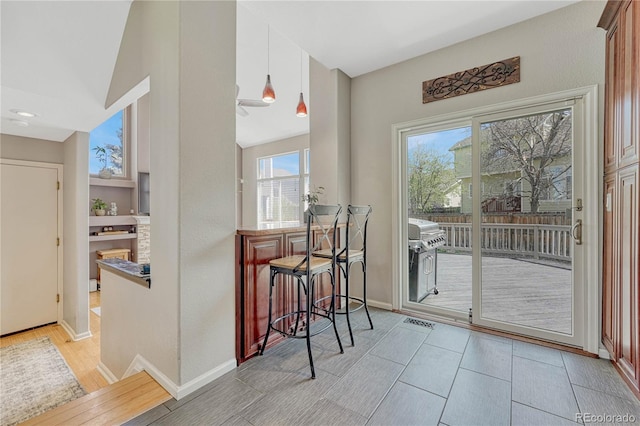 12646 S Dove Creek Way, Parker, CO 80134 - kitchen with light wood finished floors and baseboards
